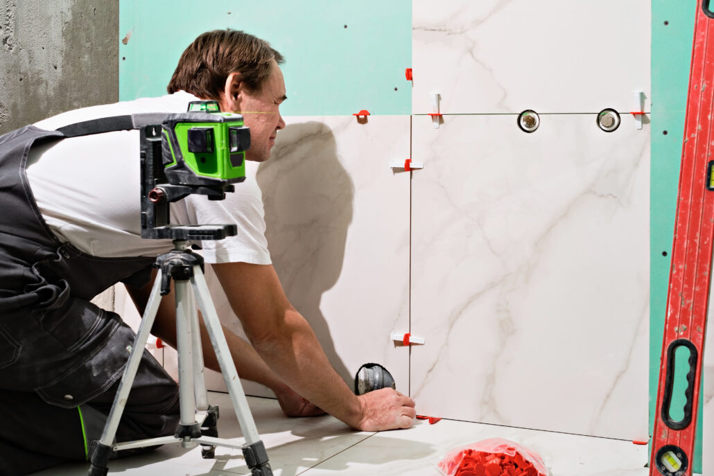handyman installing tiles